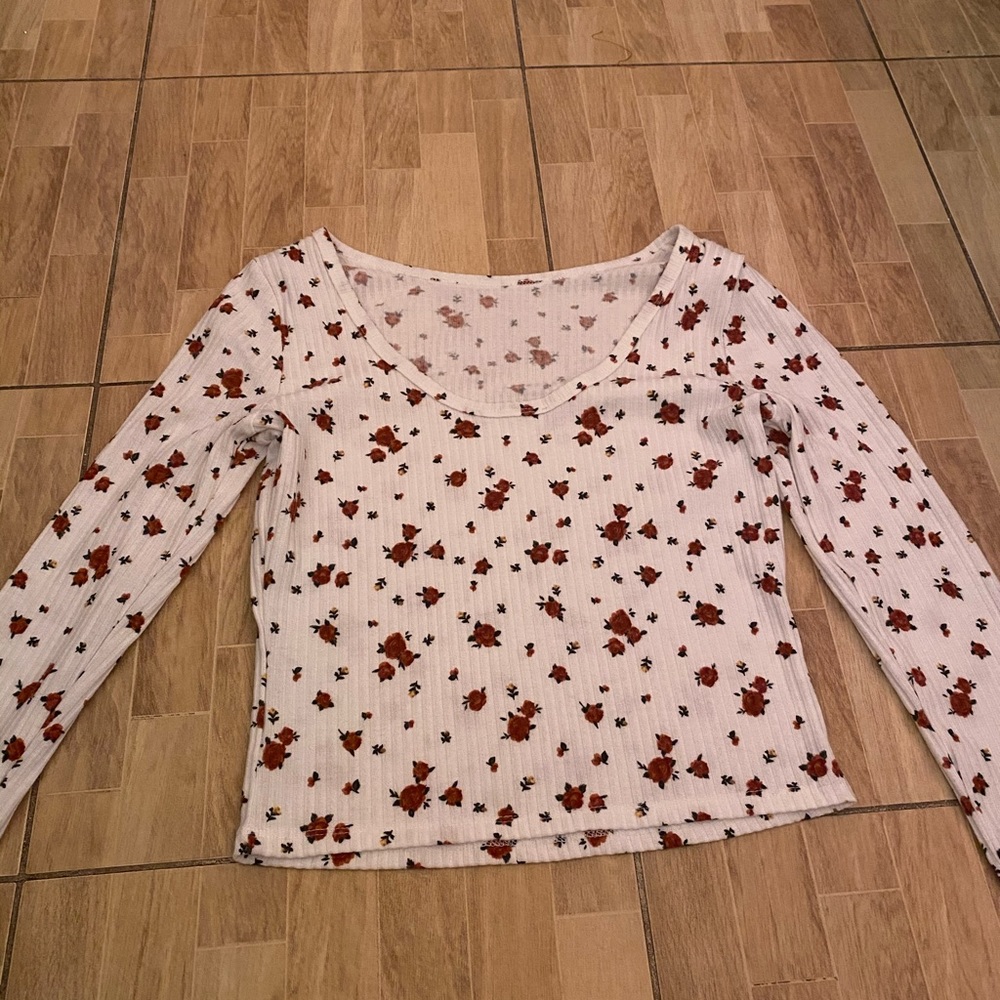 TWO long sleeve floral tops